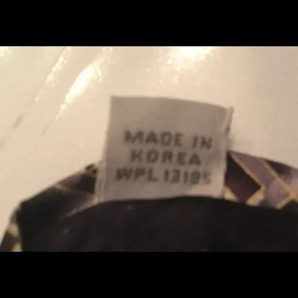 Vintage *1980s-1990s) Pierre Cardin geometric design 100% silk tie